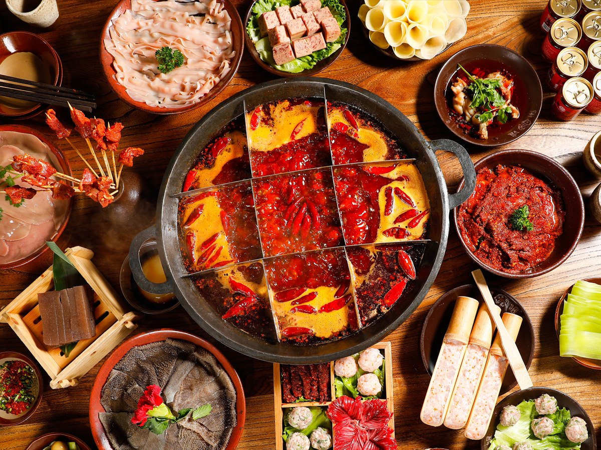 Chongqing hotpot table with dishes